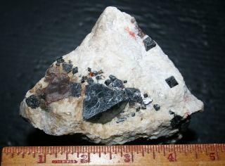 Franklinite crystals w willemite,  calcite fluorescent minerals Franklin,  NJ 3