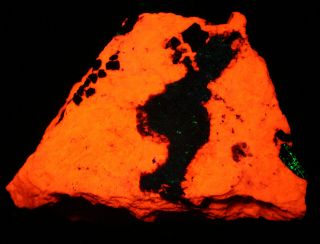 Franklinite crystals w willemite,  calcite fluorescent minerals Franklin,  NJ 4