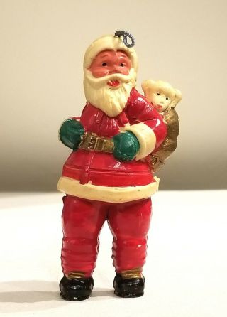 Santa With Dog In His Pack.  Empire Plastics,  Usa.  Hard Plastic Xmas Ornament