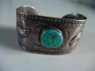 Vintage Navajo Silver And Turquoise Bracelet With Repousse Stampwork