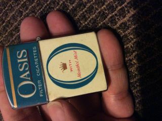 Continental cigarette brand ad lighter,  Oasis 2