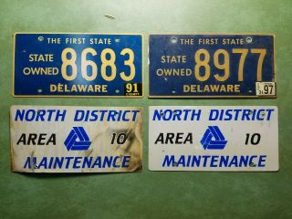Two Different State Owned Delaware License Plates And Two Deldot North District