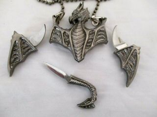 Paul Ehlers Flying Dragon Neck Knife Hidden Swords Necklace Pendant Metal Pewter