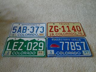 4 Different Colorado Vintage License Plates.  Look
