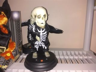 Gemmy Halloween Grave Raver Skeleton Sings " Hey Baby "