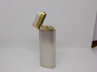 Auth CARTIER Oval Lighter Silver & Gold 8