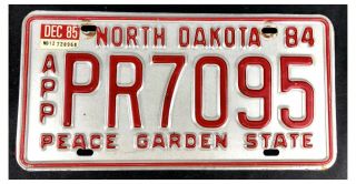 North Dakota 1984 - 1985 Apportioned Truck License Plate Pr7095 - Red On White