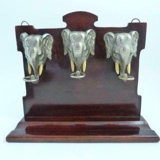 Antique Elephant Heads Pipe Rack,  19th Century