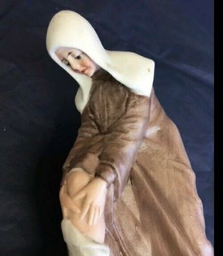 Young Nun Bisque Figurine Pulling Up her Hose - And Another Surprise 2