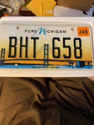 Pure Michigan License Plate Featuring Mackinac Bridge.  Bht 658.