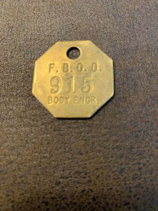 Fisher Body Plant Tool Check Brass Tag.  Body Engineering.  F.  B.  G.  O.  915.