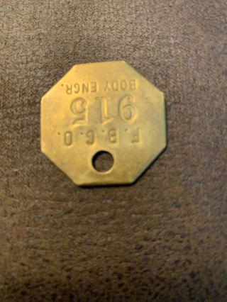 Fisher Body Plant Tool Check Brass Tag.  Body Engineering.  F.  B.  G.  O.  915. 2