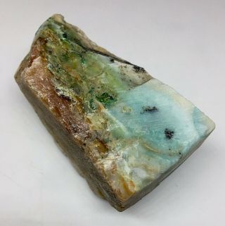 98.  3g Indonesian Blue Opalized Petrified Wood Rough Carving Stone