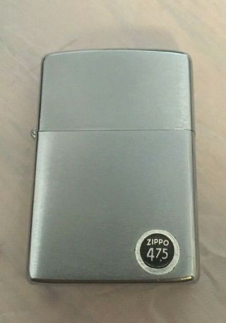 Circa 1975 Zippo Lighter with the $4.  75 price tag on Zippo 7