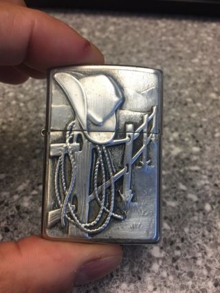Full Pewter Front Emblem 2013 Chrome Cowboy Hat And Rope On Fence Zippo Lighter