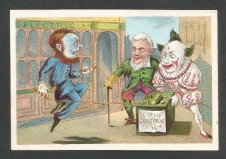 W32 - Clowns Electrocute Policeman - Victorian Xmas Card