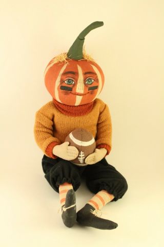 Joe Spencer Gathered Traditions Defense Dan Halloween Pumpkin Head Football Doll