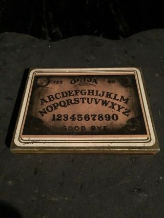 Old Tin Cigarette Case With Ouija Image And Set Of Fortune Telling Bone Runes
