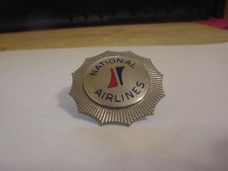 1964 National Airlines Hat Badge; Silver Sun King Logo.