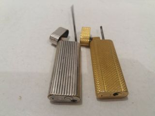cartier vintage lighter gold plated.  Made in swiss and cartier silver plated 3