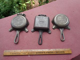 Three Different Antique Griswold Cast Iron Ashtrays One With Label