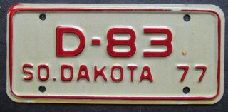 South Dakota 1977 Quality Dealer Motorcycle License Plate D - 83