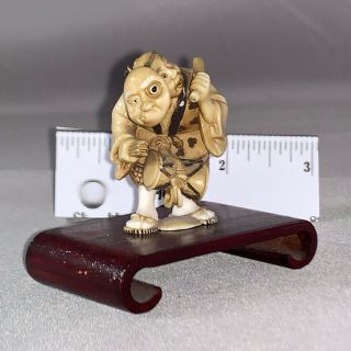 Masquerade Netsuke,  A Miniature Sculpture Carved Of Polymers In Japan