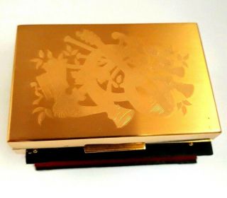 Vintage Elgin American Gold Tone Music Box Compact With Musical Instruments.
