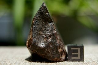 NWA Unclassified Meteorite 62.  4 grams windowed with metal & varying composition 5