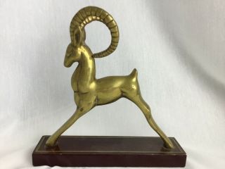 Vintage Brass Gazelle Sculpture On Cherry Wood Colored Stand.
