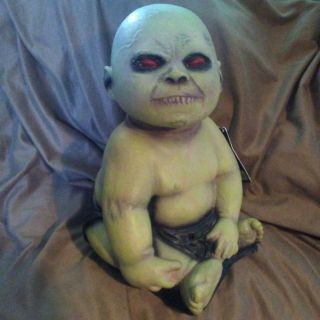Creepy Motion Activated Spinning Head Zombie Baby With Sounds