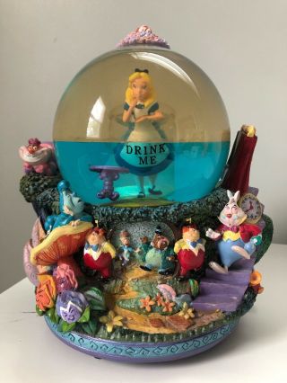 Disney Alice In Wonderland Drink Me - Snow Globe " All In The Golden " Blue Water