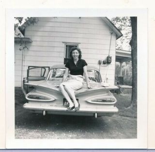 1950s Orig.  Amateur Leg Art Snapshot Photo Cute Brunette Sitting On Chevrolet