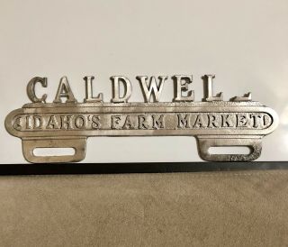 Caldwell,  Idaho License Plate Topper “idaho’s Farm Market” Very Rare Missing “l”