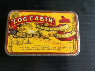 " Log Cabin " Tobacco Tin