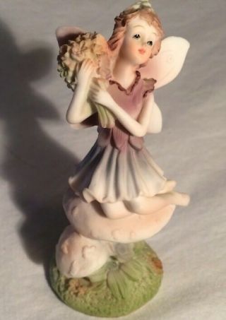 Polystone Fairy - 5 " Tall Fairy Holding A Bouquet Of Flowers - On Mushroom