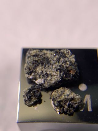 Meteorite NWA D’ORBIGNY ; Angrite 0.  11 Grams; Rarest Type Piece 2
