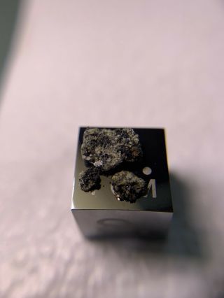 Meteorite NWA D’ORBIGNY ; Angrite 0.  11 Grams; Rarest Type Piece 3