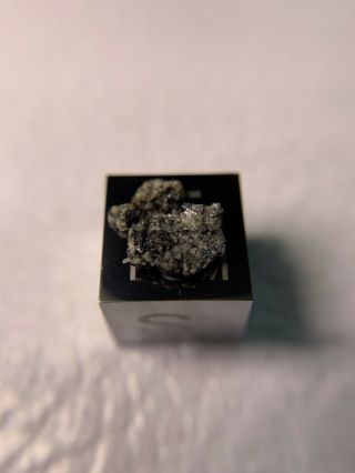 Meteorite NWA D’ORBIGNY ; Angrite 0.  11 Grams; Rarest Type Piece 4