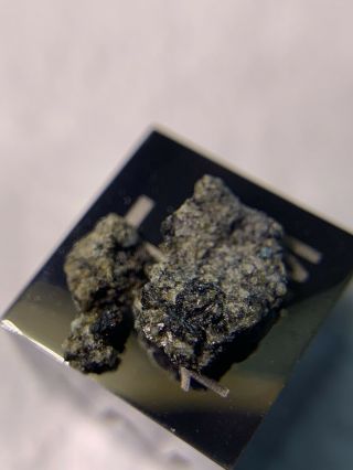 Meteorite NWA D’ORBIGNY ; Angrite 0.  11 Grams; Rarest Type Piece 7