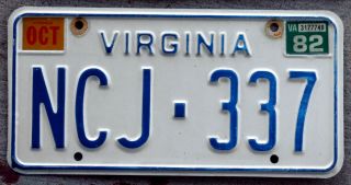 6 - Digit Blue And White Virginia License Plate With A 1982 Sticker
