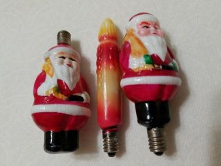 3 Vintage Milk Glass Figural Light Bulbs Christmas 2 Santas And A Candlestick