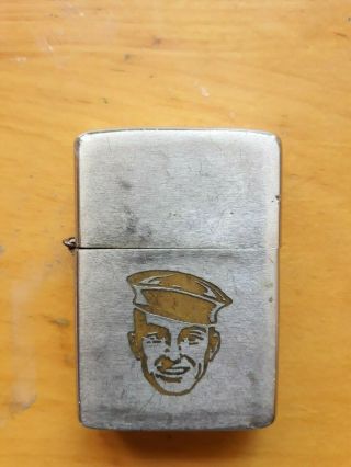 Vintage 1961 Zippo lighter with sailor image and hinge repair 2