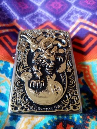 Golden devil dragon zippo 2018 very little use comes with insert 2