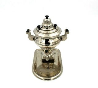 DECORATIVE RUSSIAN SAMOVAR IN POLISHED ALLOY W/ PLATE 5.  5 