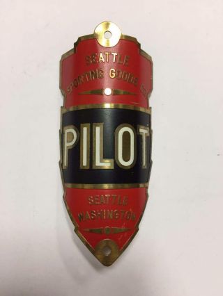 Antique Nos Seattle Sporting Goods Pilot Bicycle Head Badge Head Tag Emblem