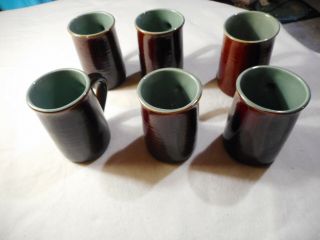 6 Vintage Redwing Pottery Brown And Teal Coffee Mugs.