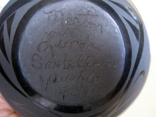 Black on black Santa Clara Pueblo pot signed by Merton & Linda Sisneros - 1997 6