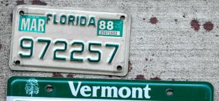 Green on White Florida MOTORCYCLE License Plate with a 1988 Sticker 2