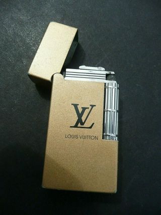 Louis Vuitton Vintage Lighter.  Well.  Engineering Made.  Quality